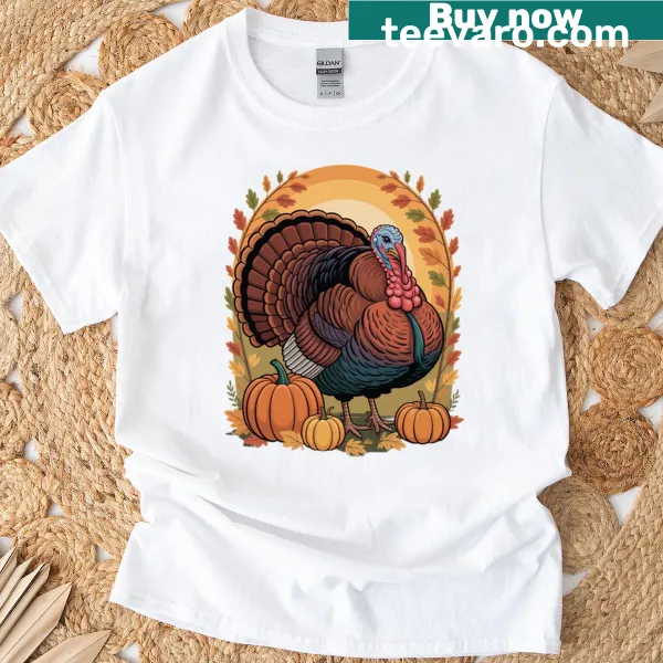 Thanksgiving-themed T-shirt with autumn harvest scene, turkey, and pumpkins.