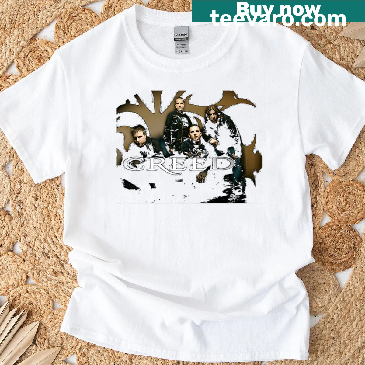 Distressed graphic T-shirt featuring the Creed band — on a men's t-shirt