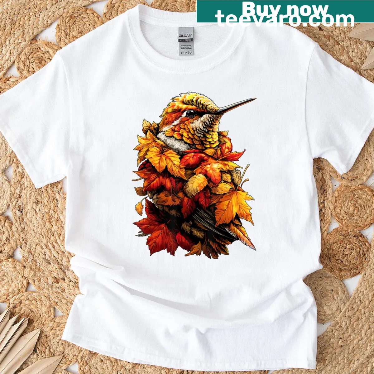 Illustrated hummingbird with autumn leaves design on a t-shirt — on a men's t-shirt