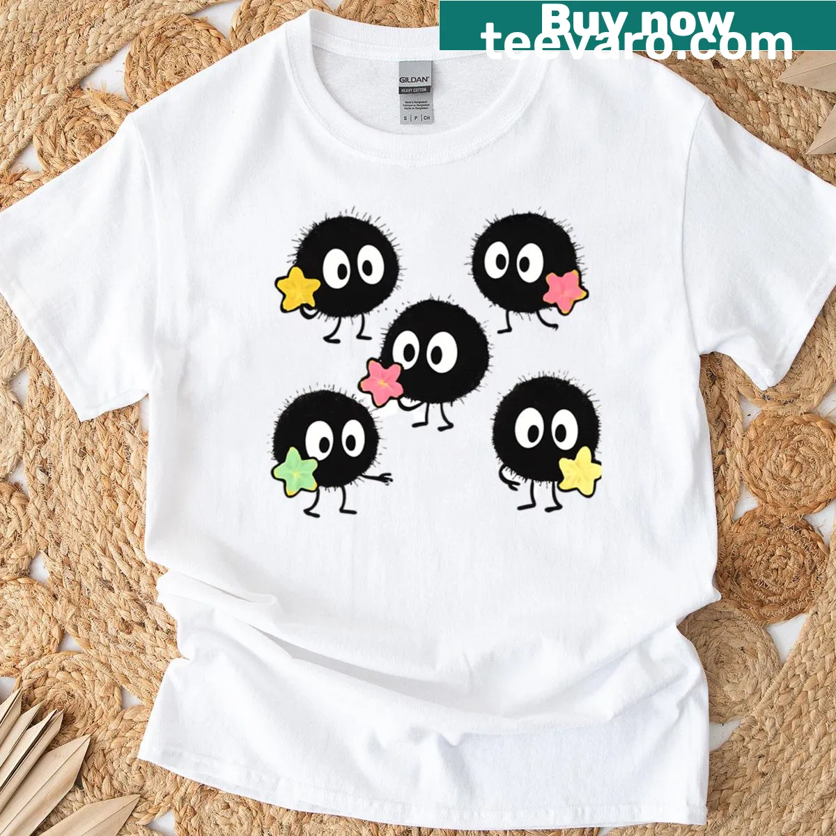 Cute soot creatures illustrated with stars on a T-shirt — on a men's t-shirt