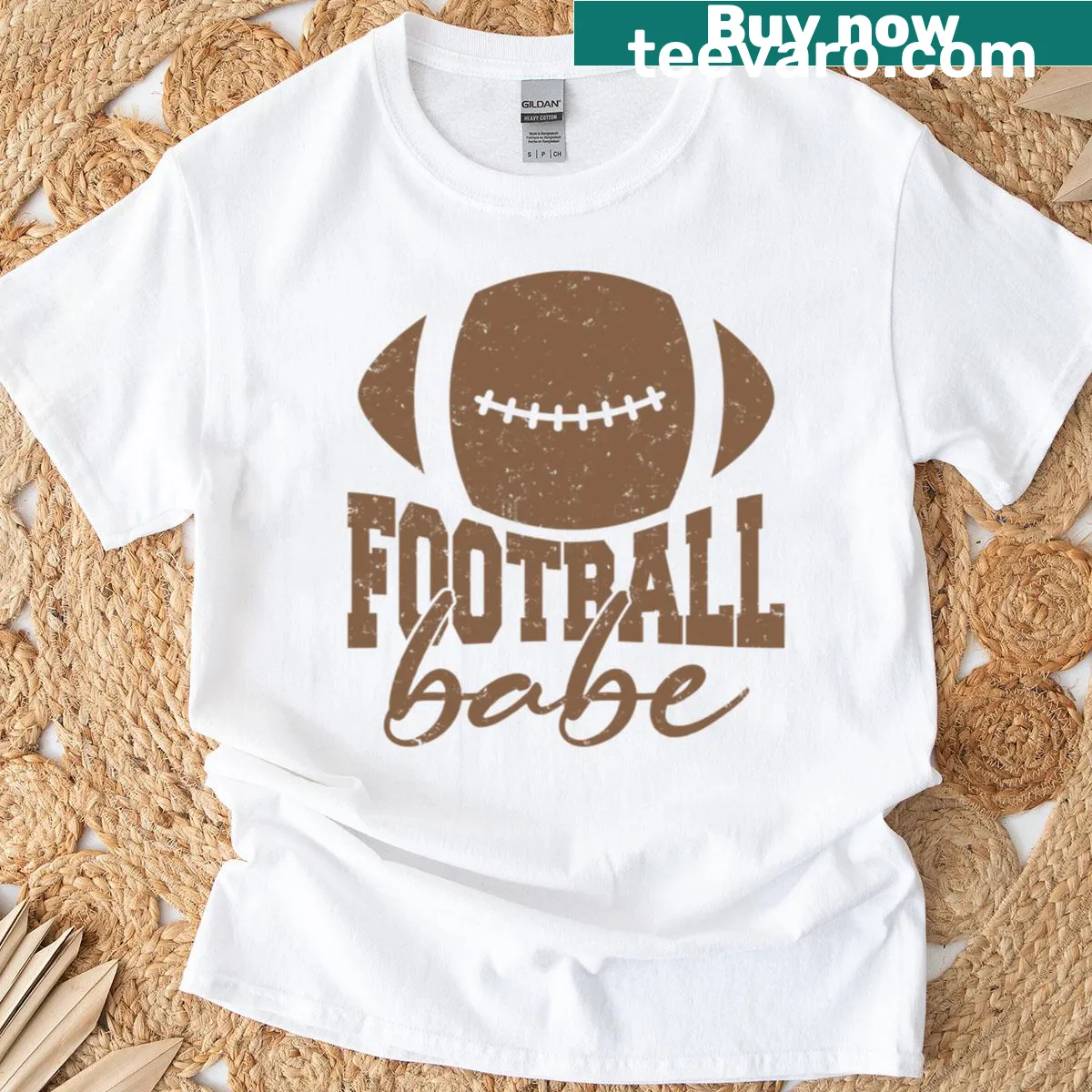 Distressed vintage t-shirt with football-themed graphics for fans. — on a men's t-shirt