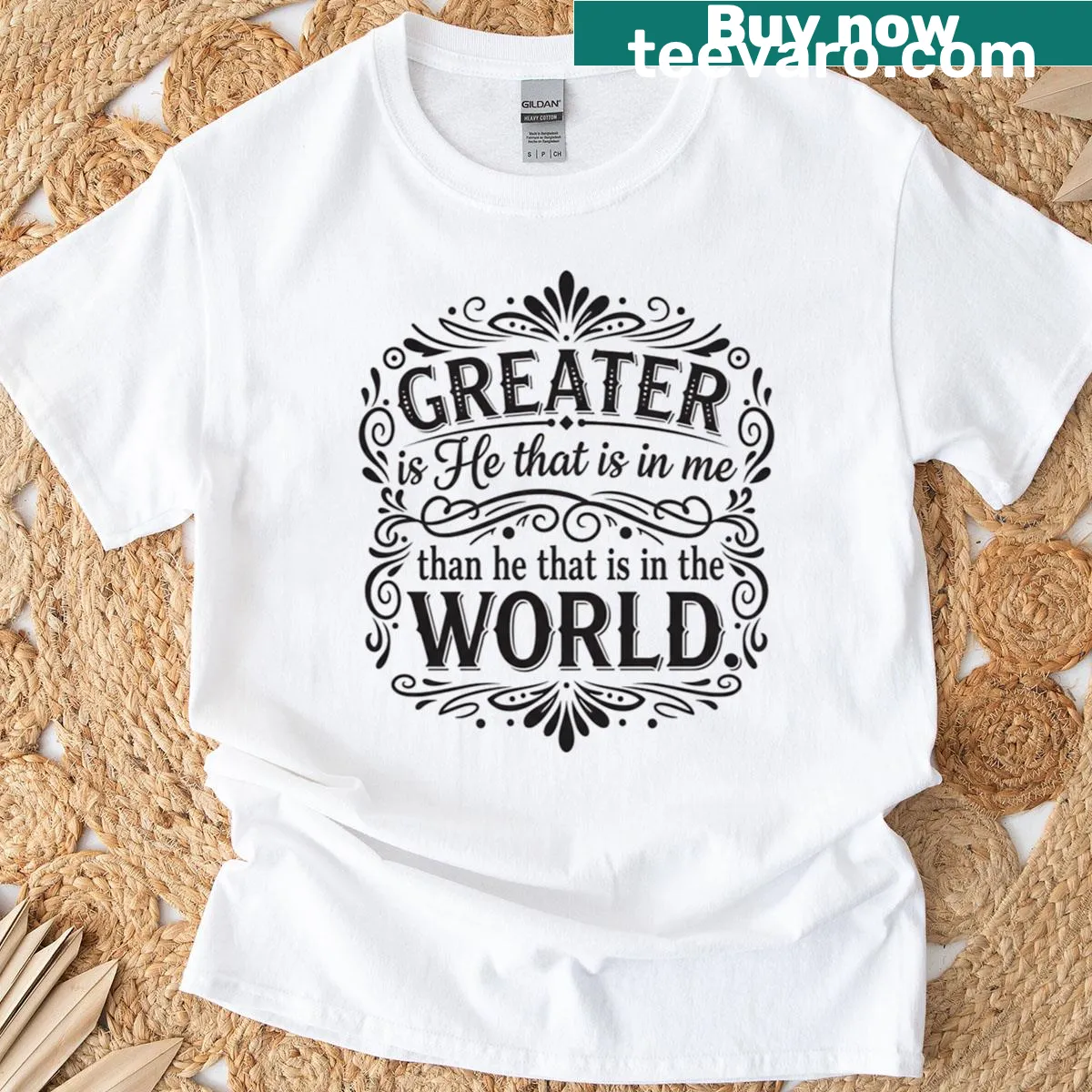 Inspirational T-shirt with the phrase 'Greater Is He' — on a men's t-shirt
