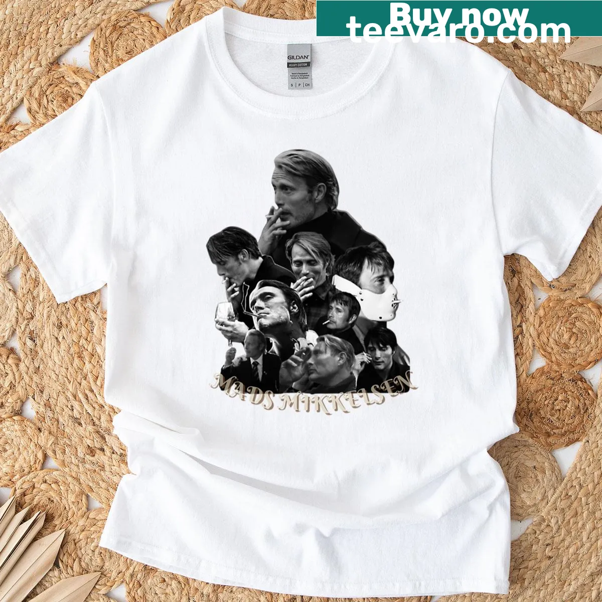 T-shirt featuring artistic graphic of Mads Mikkelsen smoking — on a men's t-shirt