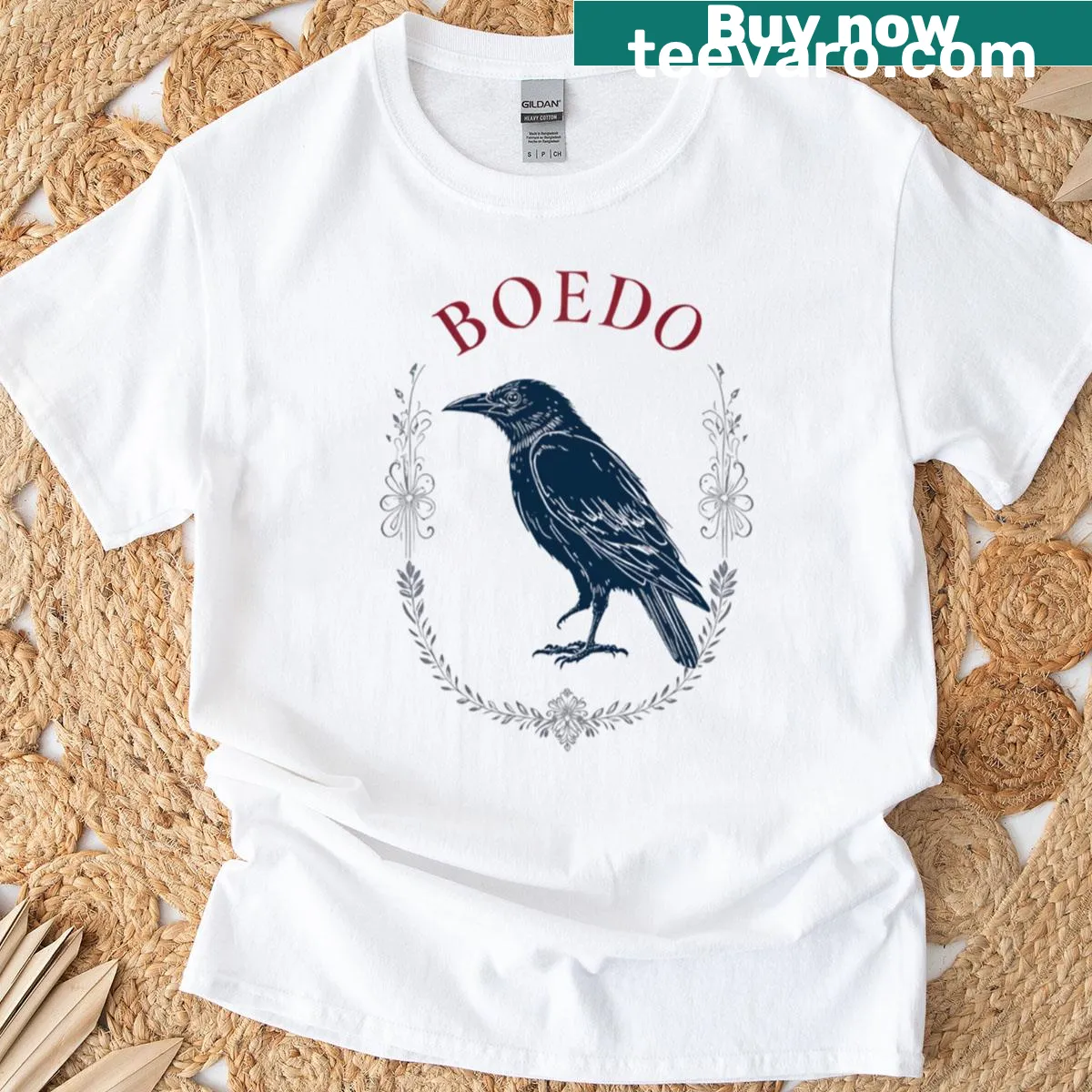 Minimalist raven design on Cuervo Boedo fan t-shirt — on a men's t-shirt