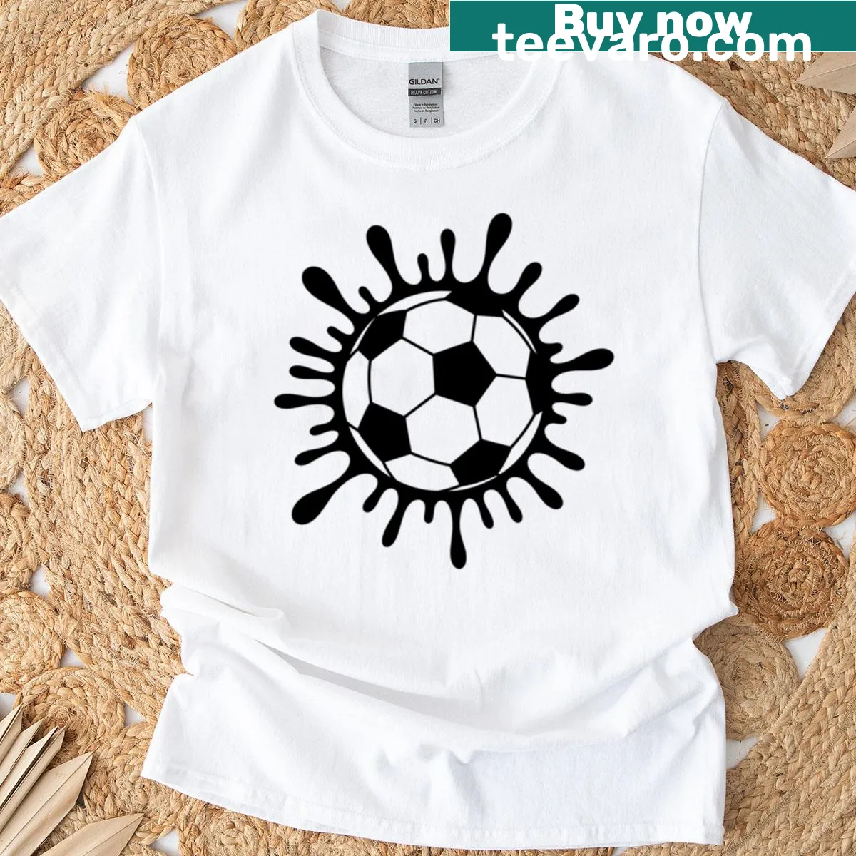 Playful soccer ball splat graphic t-shirt — on a men's t-shirt