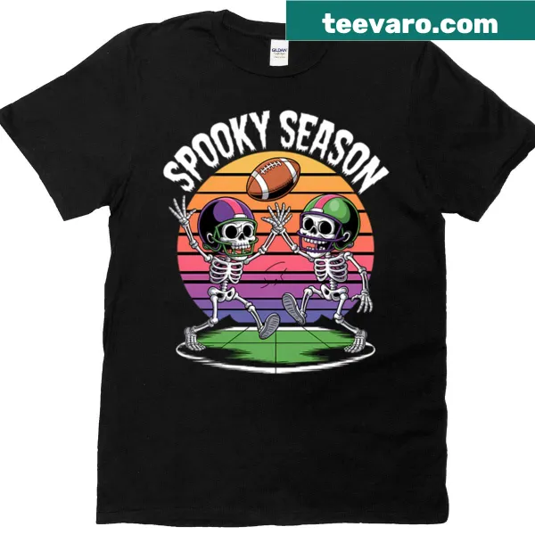 Cute Halloween T-shirt featuring a skeleton playing football.