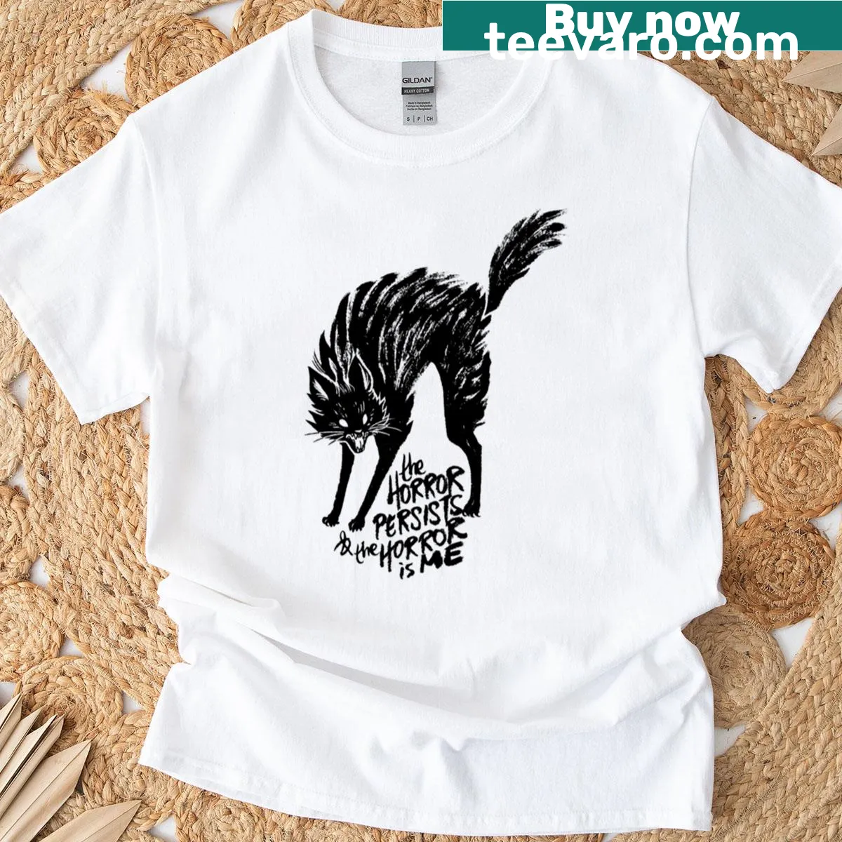 T-shirt with bold text 'The Horror Is Me' in striking typography — on a men's t-shirt