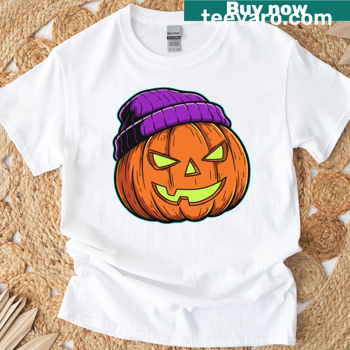 Urban-inspired t-shirt featuring a menacing Halloween pumpkin illustration — on a men's t-shirt