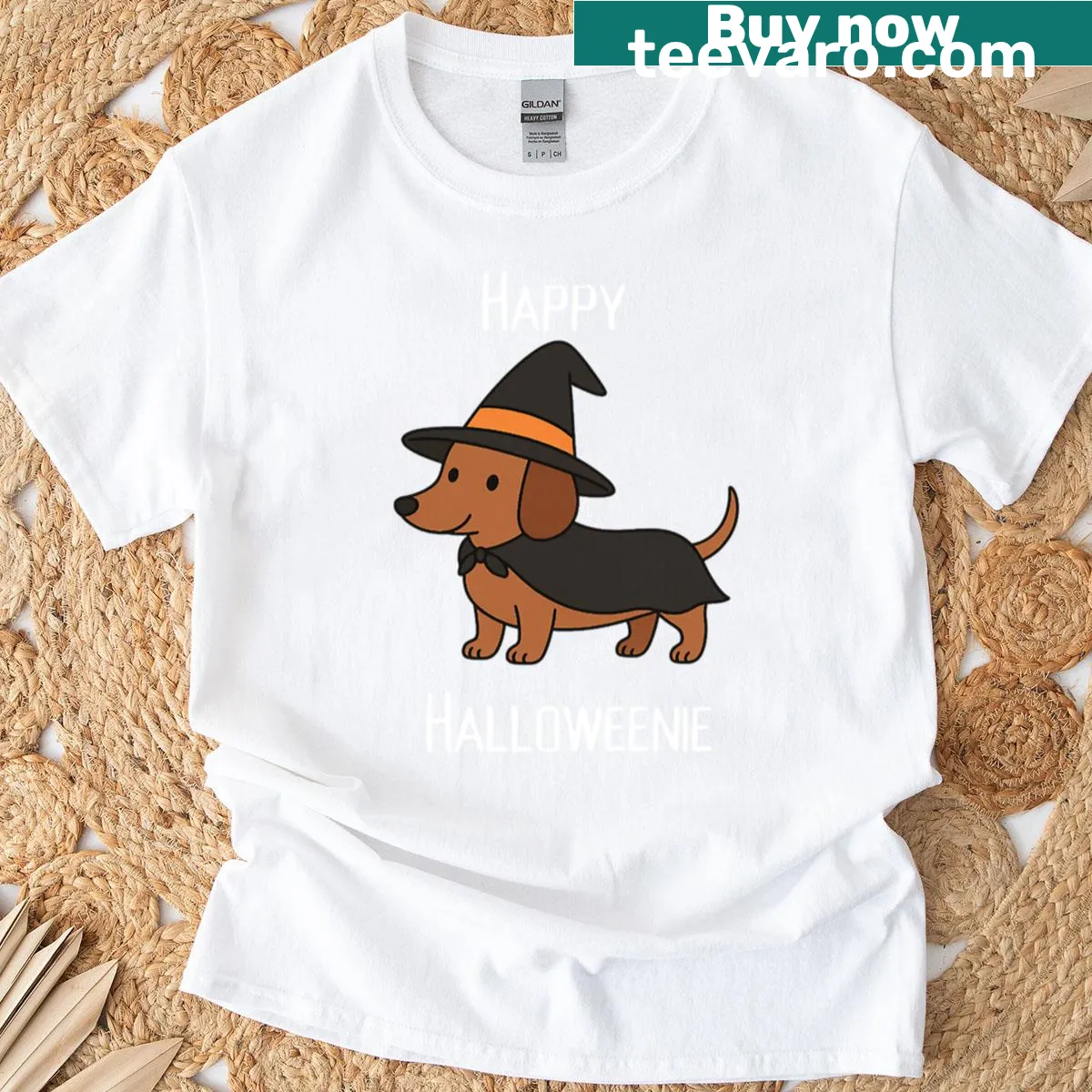 Cute dachshund in witch hat graphic on a T-shirt — on a men's t-shirt