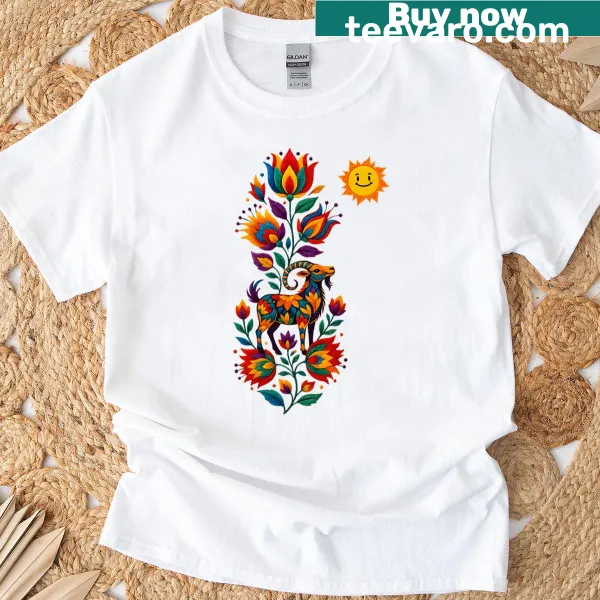 T-shirt featuring an embroidered goat design surrounded by flowers
