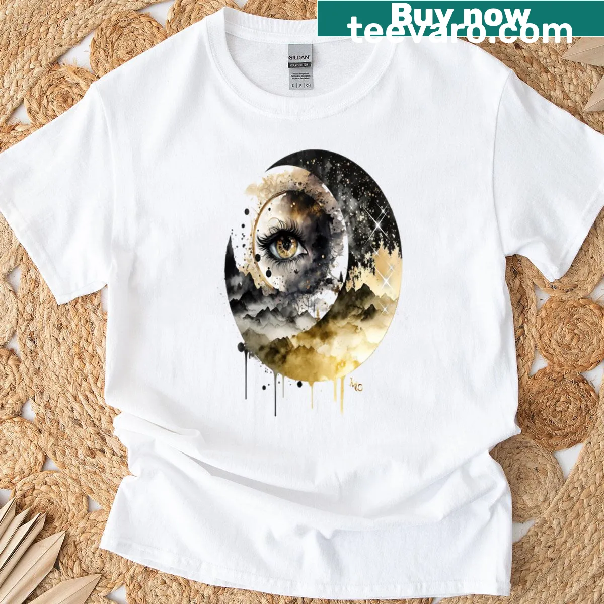 Minimalist illustrated mystical eye and moon design on T-shirt — on a men's t-shirt