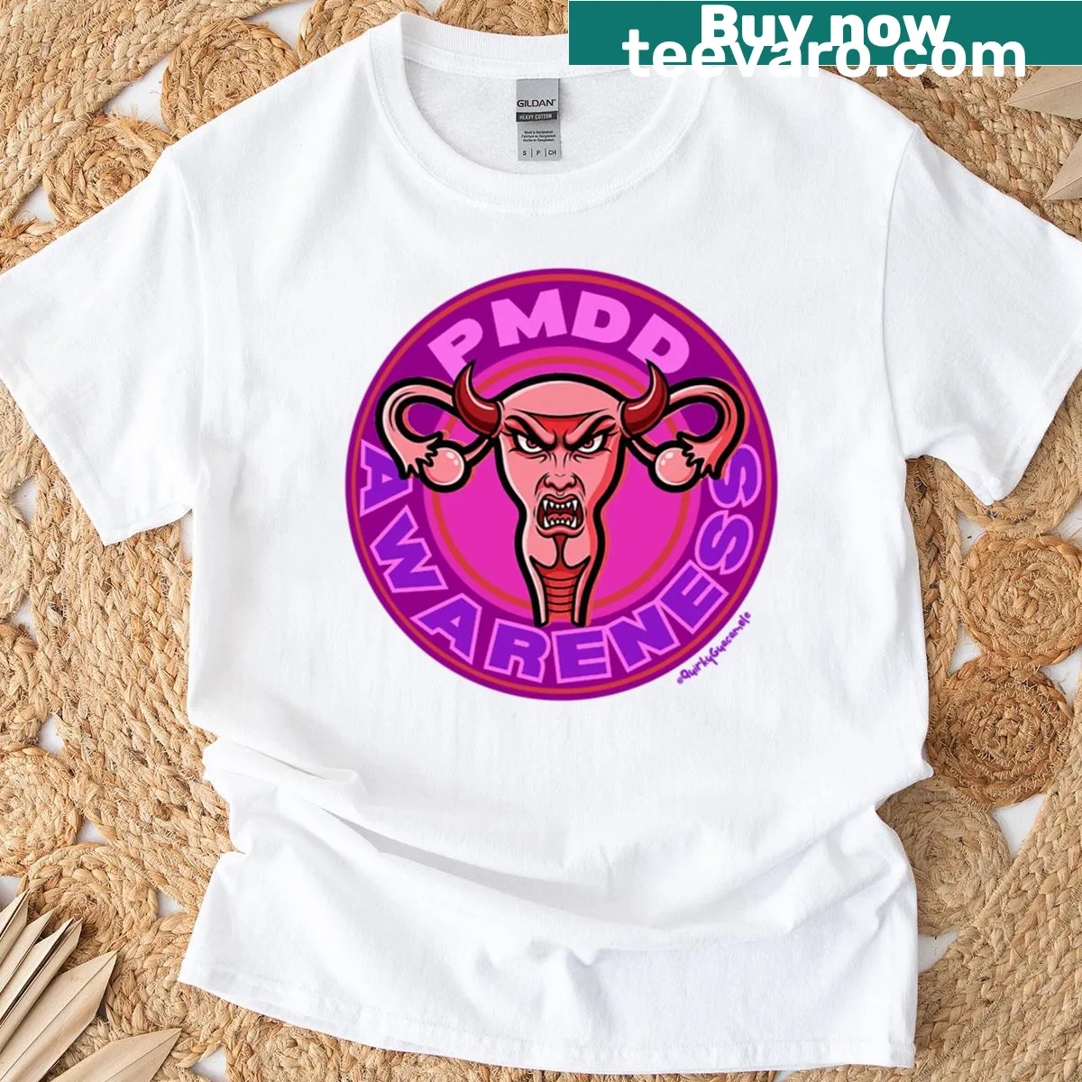 Pmdd Awareness t-shirt with bold angry womb graphic — on a men's t-shirt