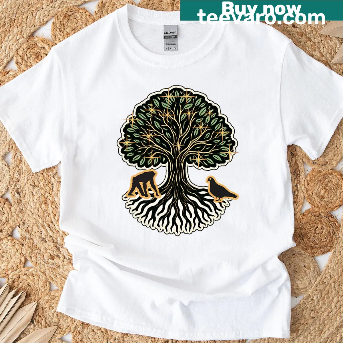 Inspirational nature art T-shirt featuring a mystical tree with animals and stars — on a men's t-shirt