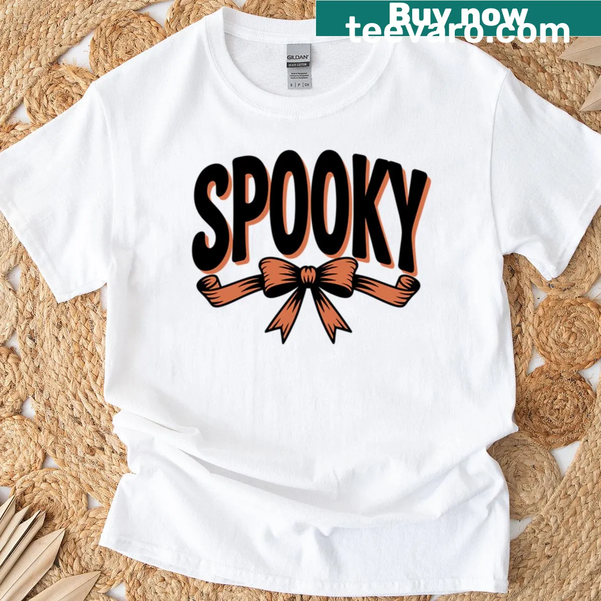 Cartoon spooky bow graphic on a playful Halloween T-shirt. — on a men's t-shirt