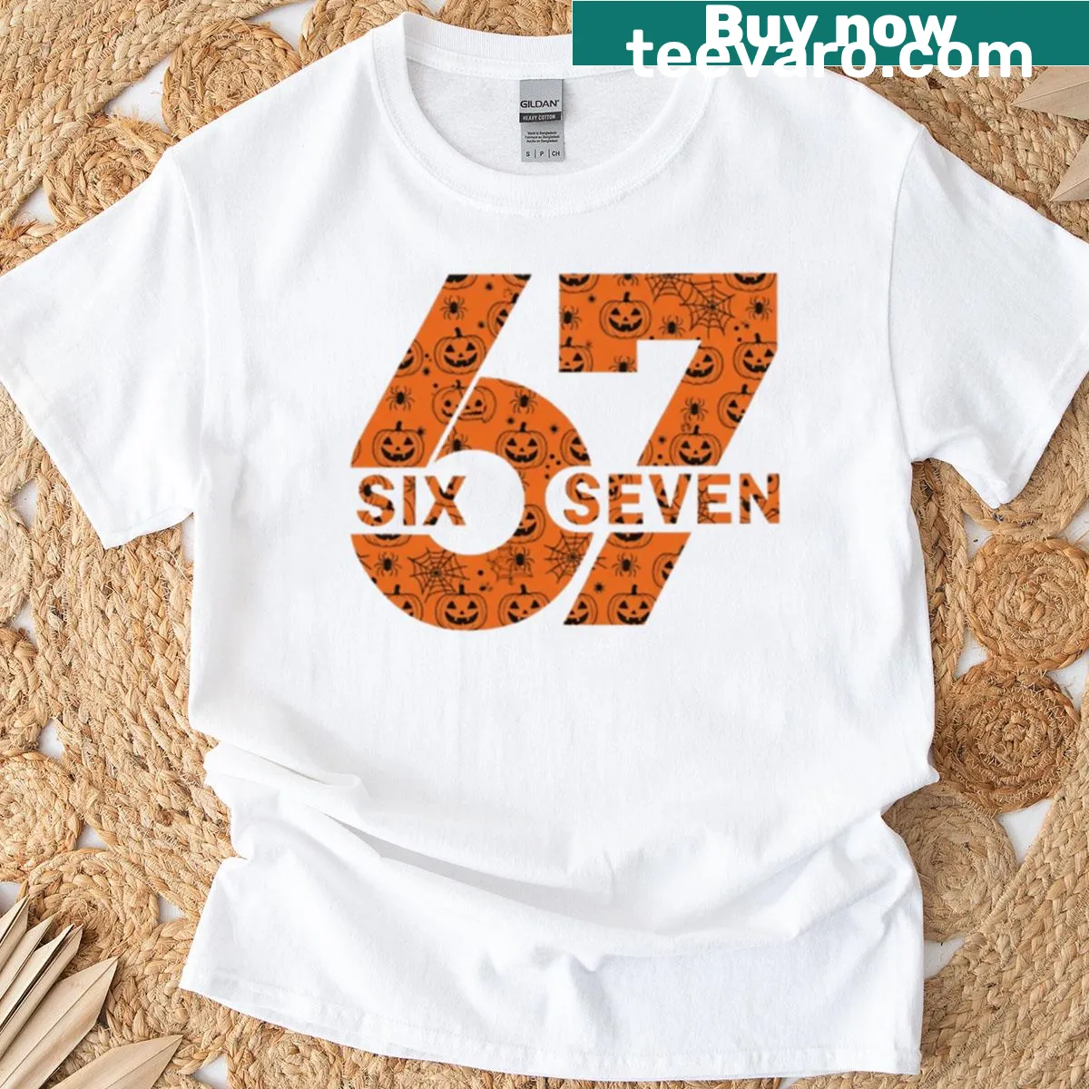 T-shirt with playful jack-o'-lanterns and spider webs for Halloween. — on a men's t-shirt