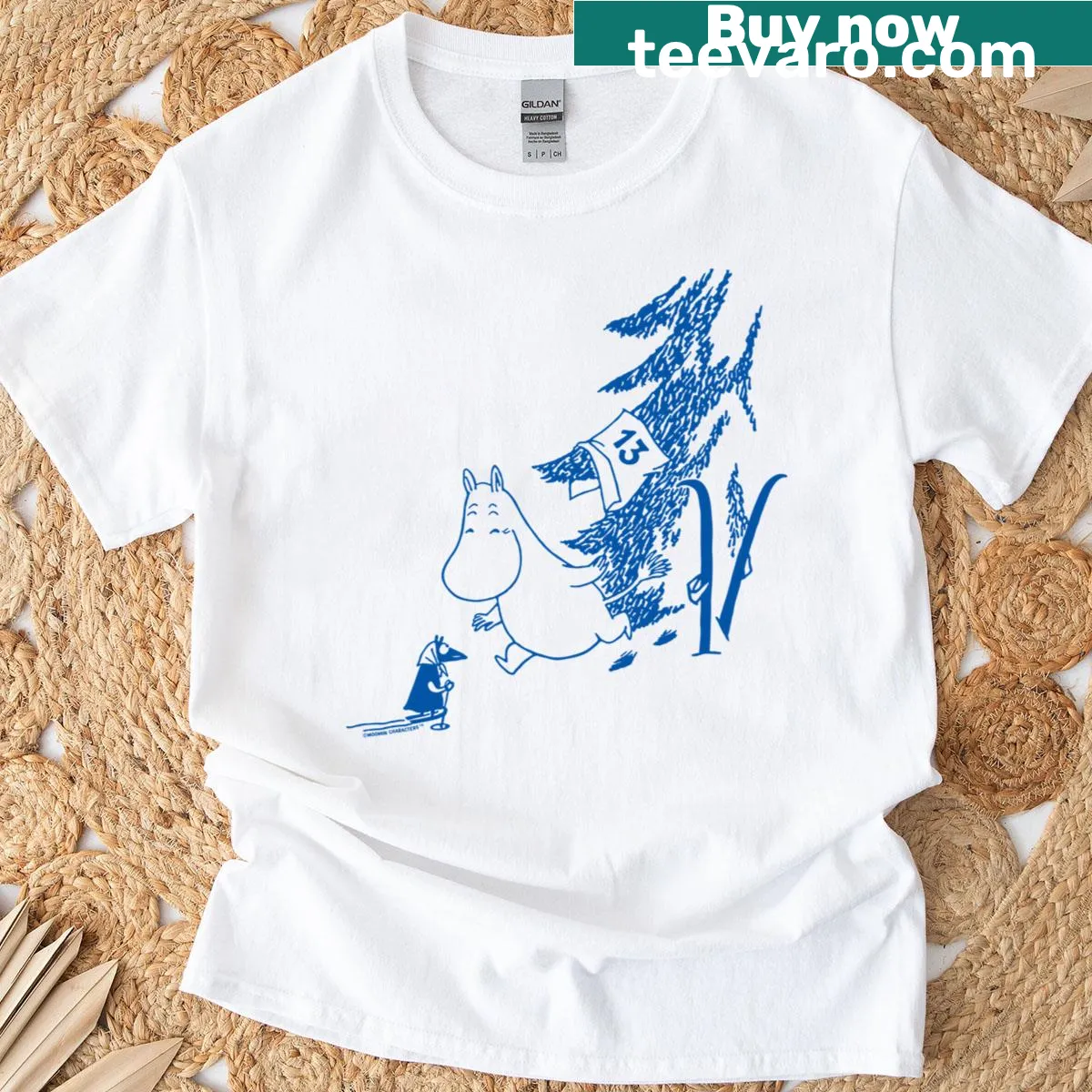 Whimsical T-shirt featuring Moomintroll après ski design — on a men's t-shirt