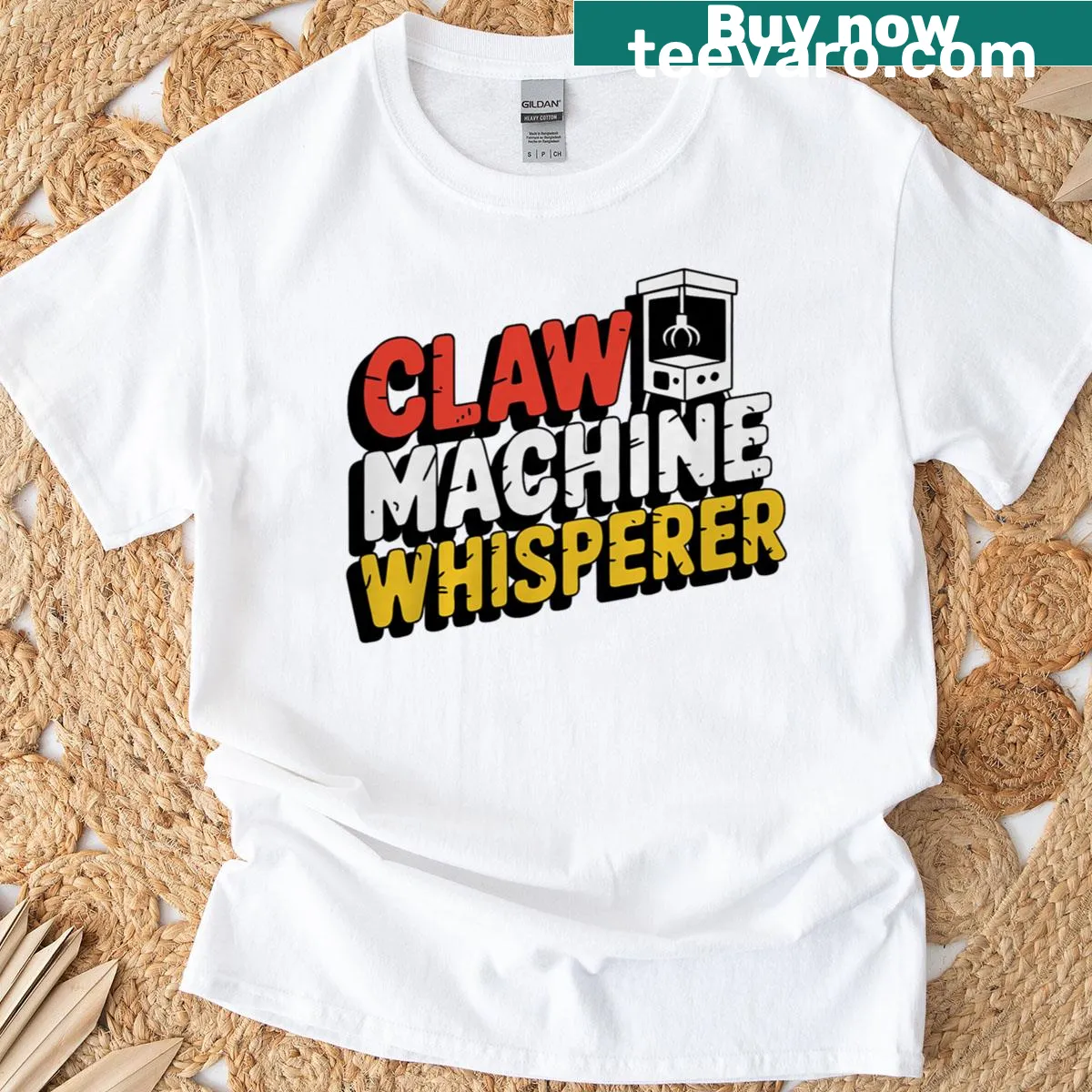 Badge-style graphic t-shirt for claw machine enthusiasts — on a men's t-shirt