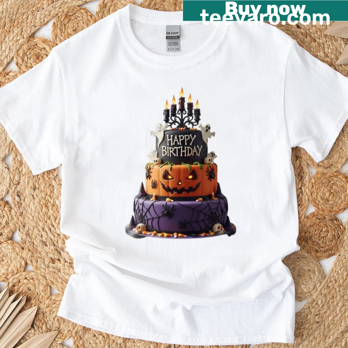Whimsical t-shirt featuring a Halloween birthday cake graphic — on a men's t-shirt