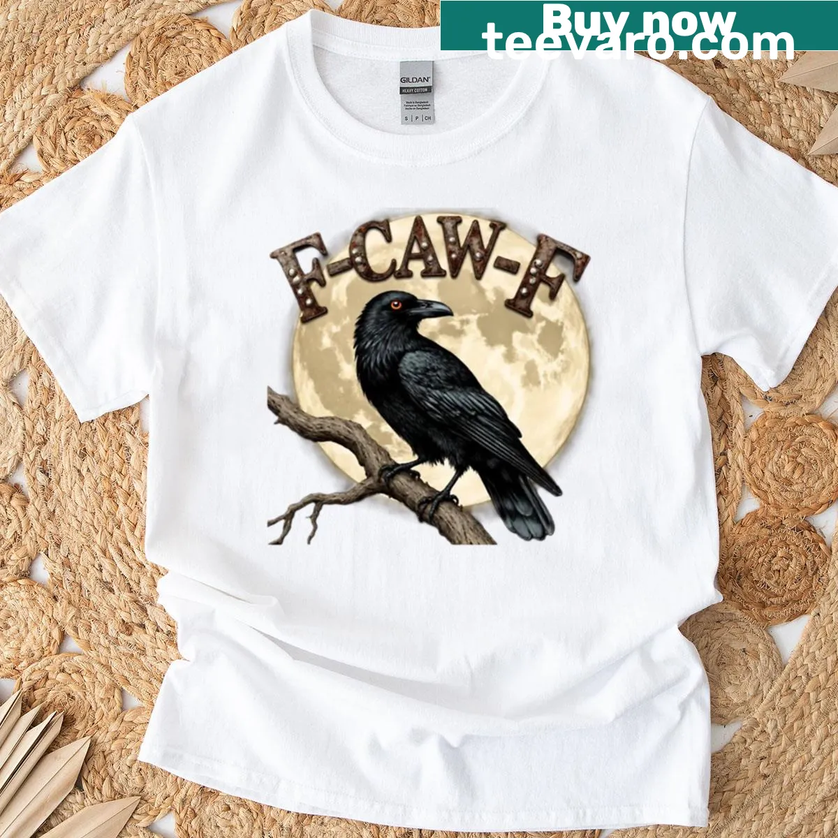 Artistic raven t-shirt featuring a glowing lunar theme — on a men's t-shirt