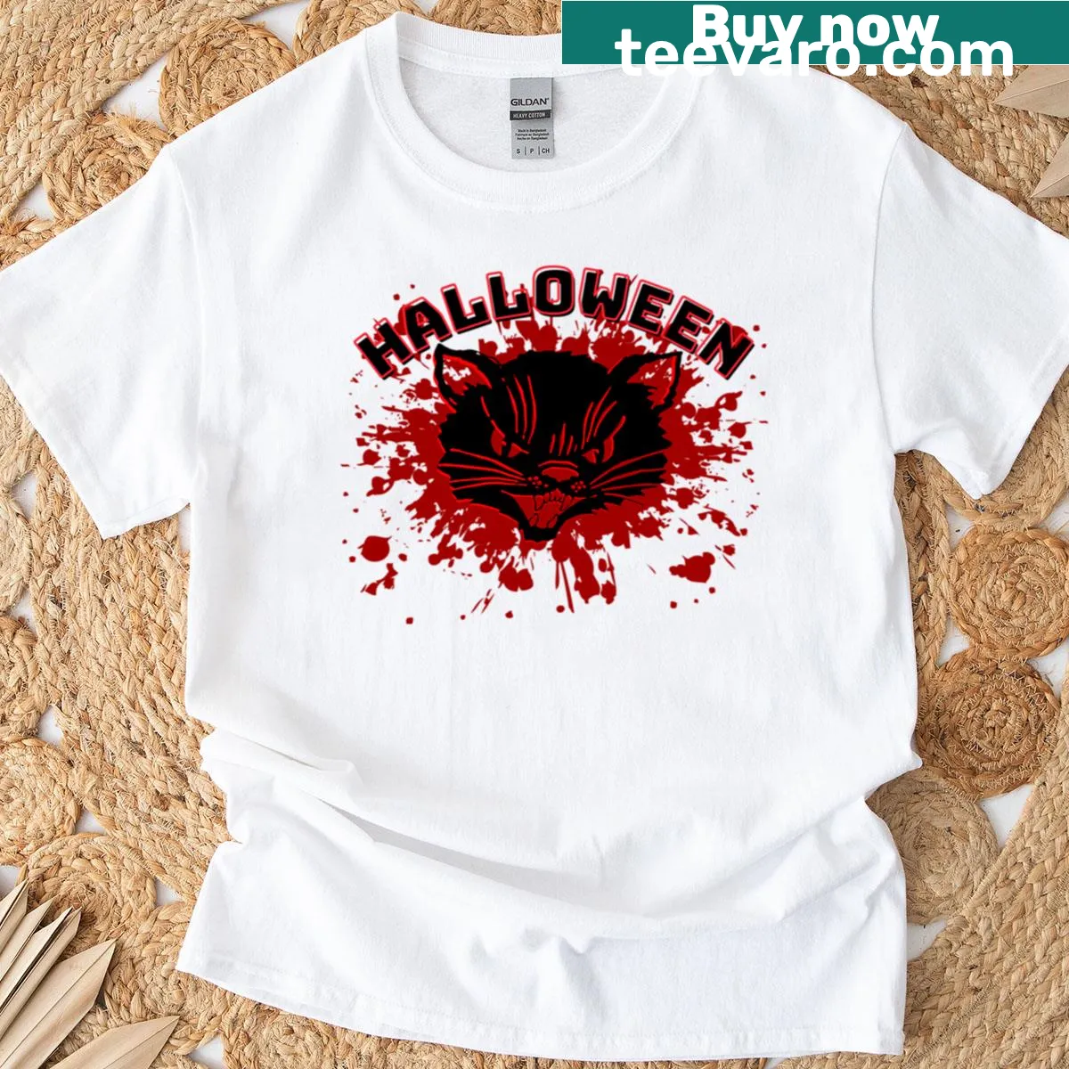 Oversized Halloween shirt featuring a whimsical cat design with a spooky hat. — on a men's t-shirt