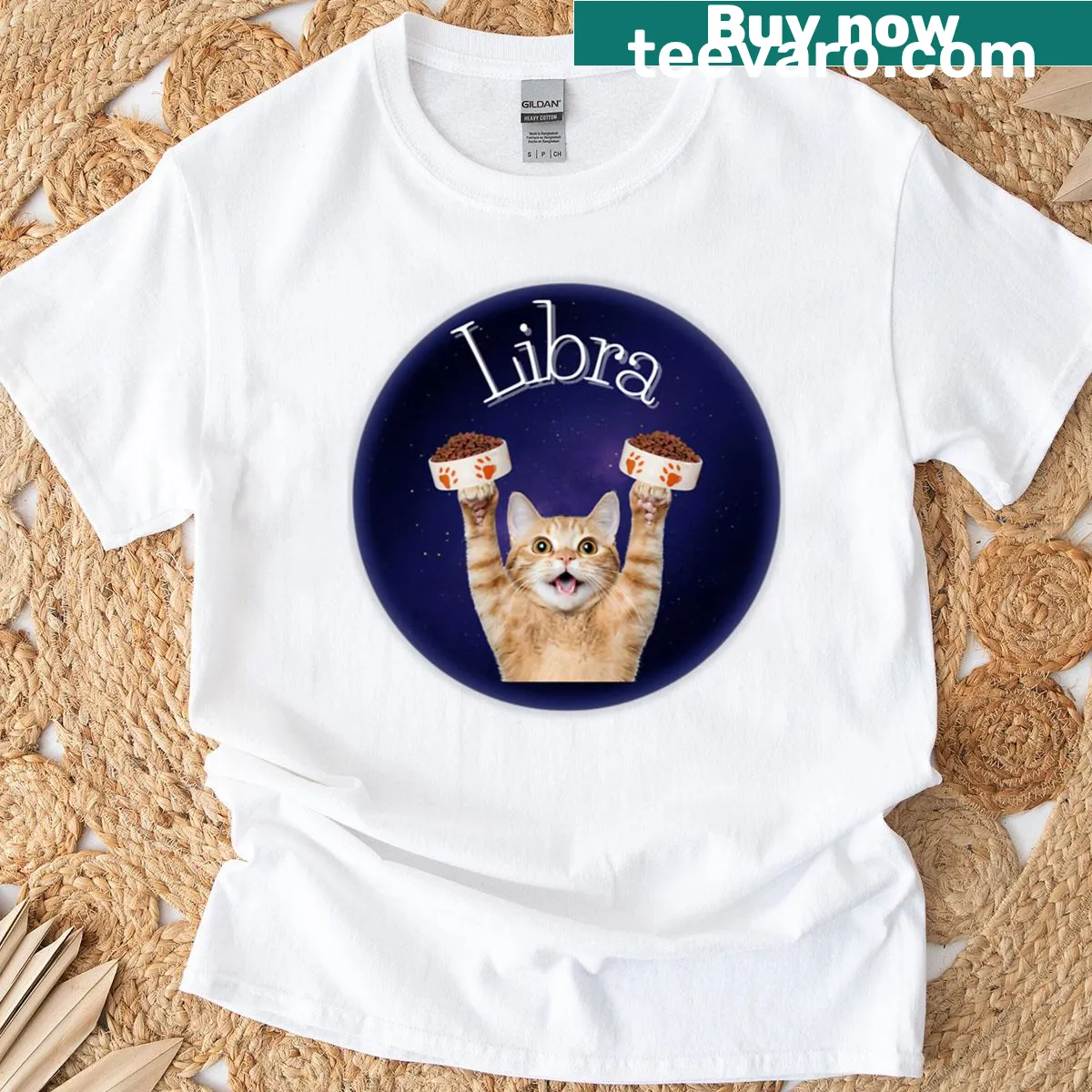 Illustrated t-shirt featuring a cat representing Libra zodiac balance — on a men's t-shirt
