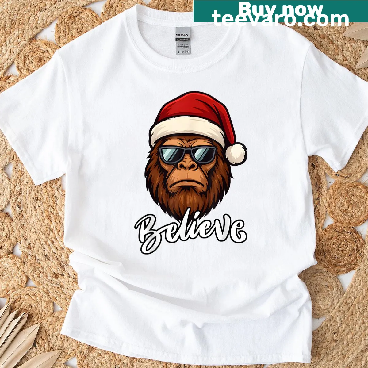 Bigfoot in Santa costume with 'Believe' sign graphic — on a men's t-shirt