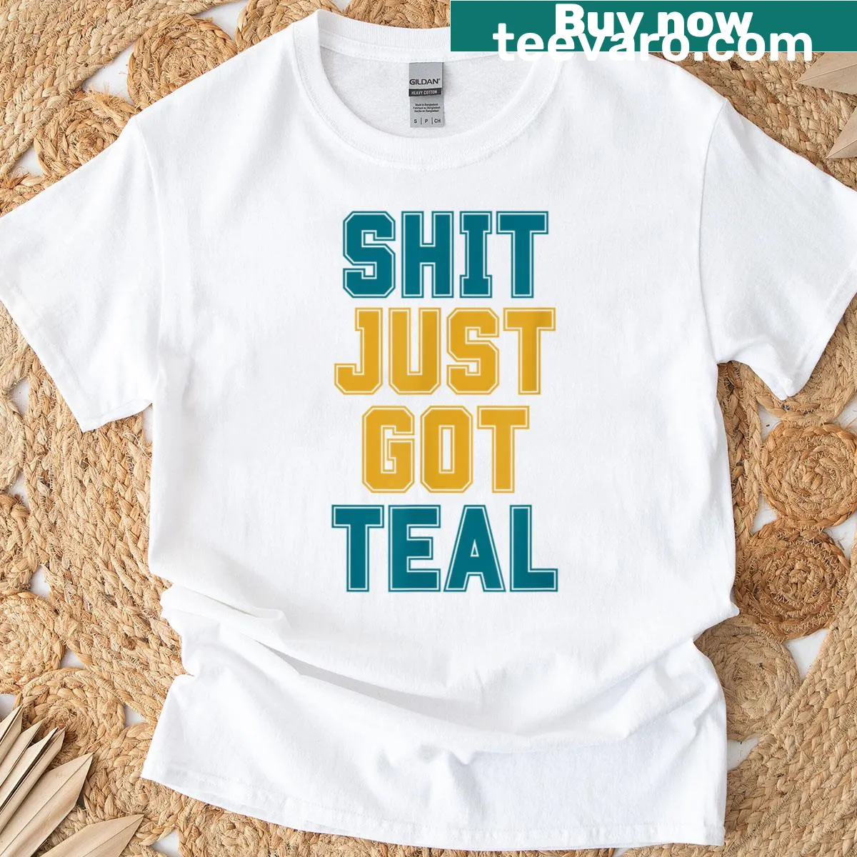 Humorous text T-shirt with the phrase 'Shit Just Got Teal' — on a men's t-shirt