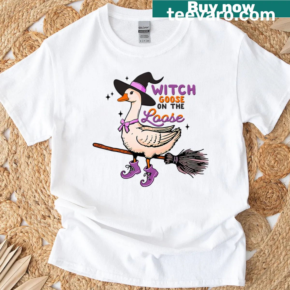 Cute witch goose Halloween graphic T-shirt — on a men's t-shirt
