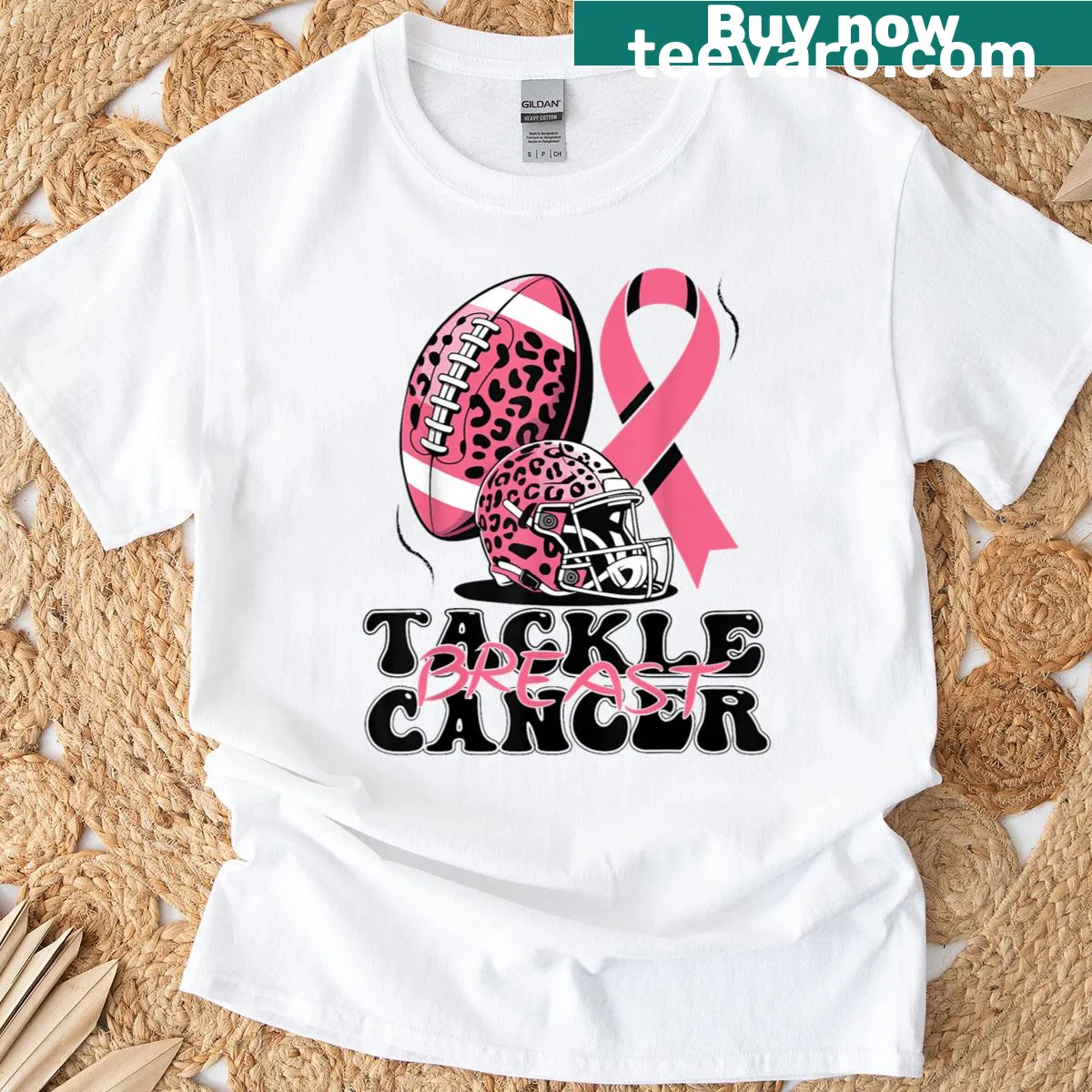 Football-themed breast cancer awareness t-shirt with bold graphics — on a men's t-shirt
