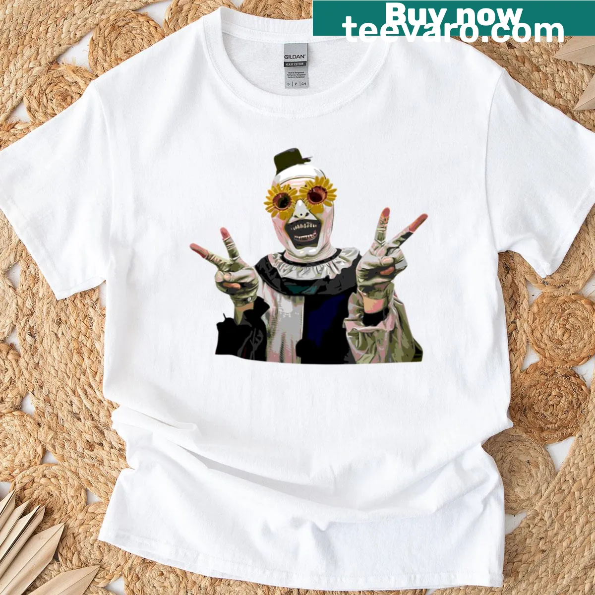 Terrifier Art The Clown graphic t-shirt with horror-themed design. — on a men's t-shirt