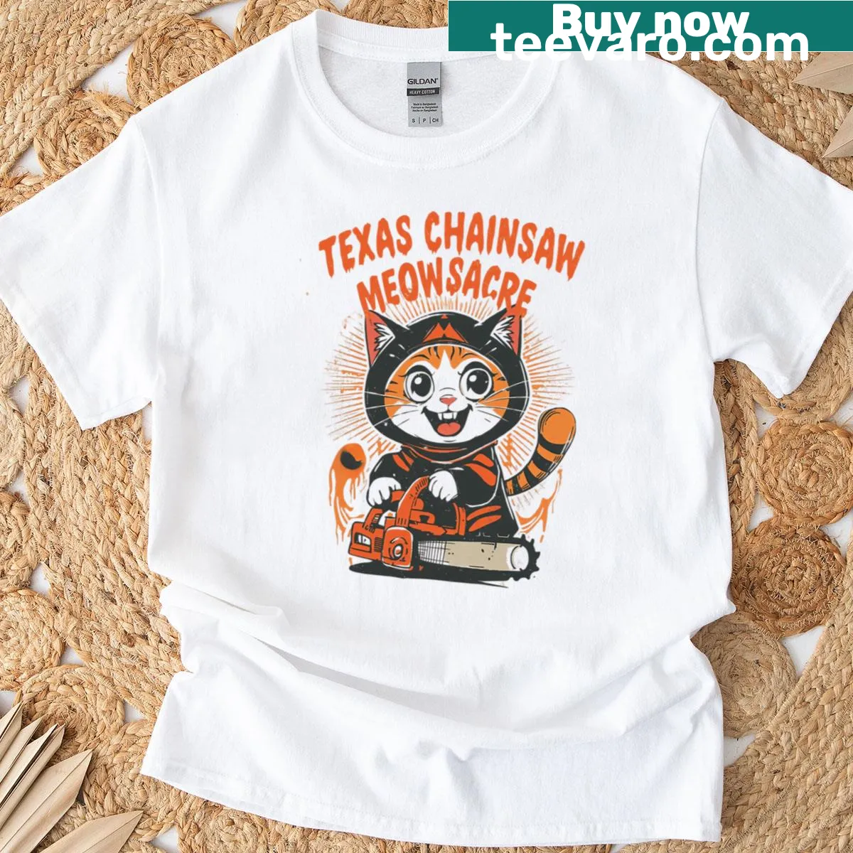 Horror-themed cat t-shirt with chainsaw and playful graphics — on a men's t-shirt