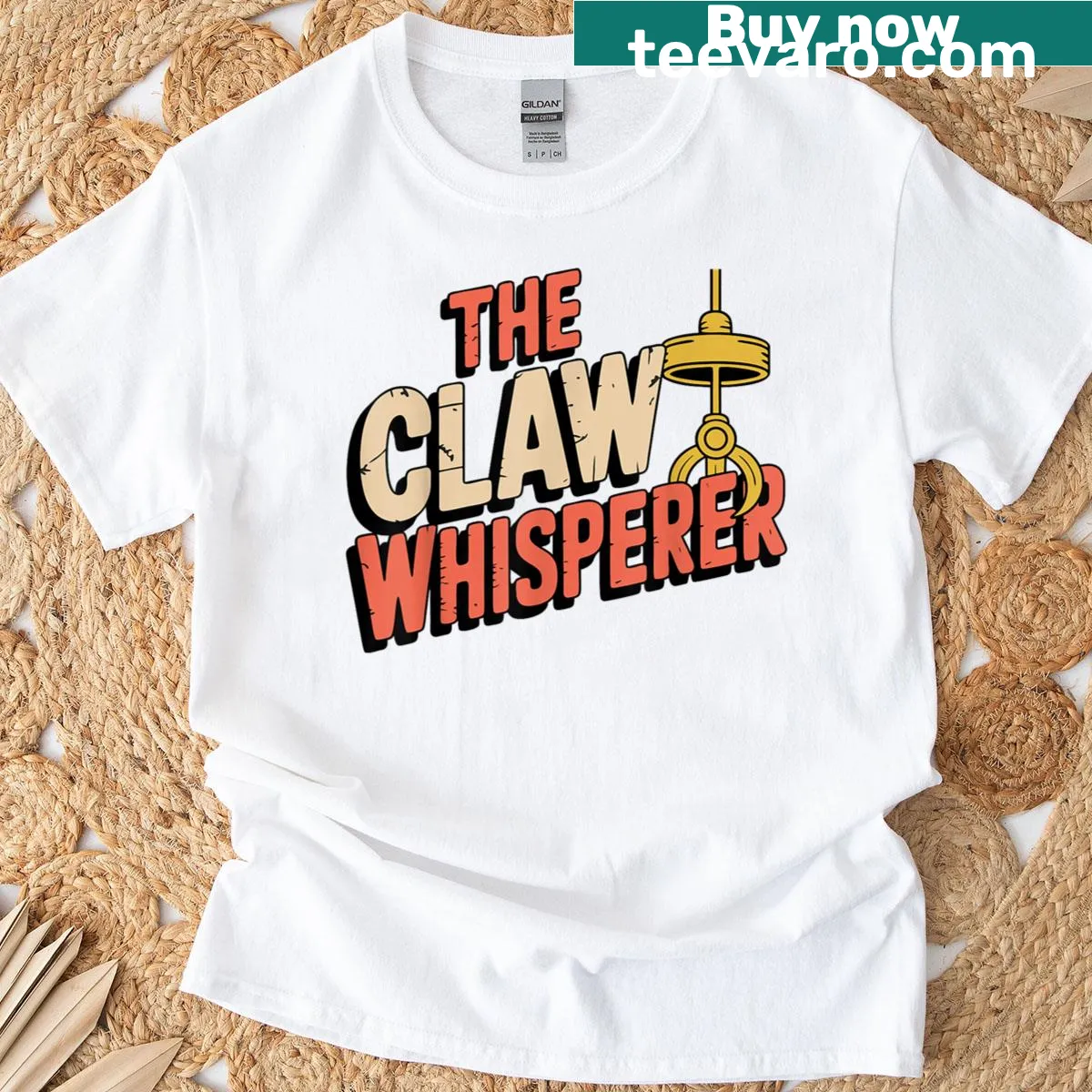 Playful claw machine graphic on a vintage arcade t-shirt — on a men's t-shirt