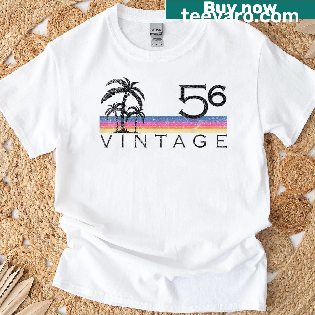 Vintage surfing T-shirt featuring a sunset and surf scene from 1956 — on a men's t-shirt