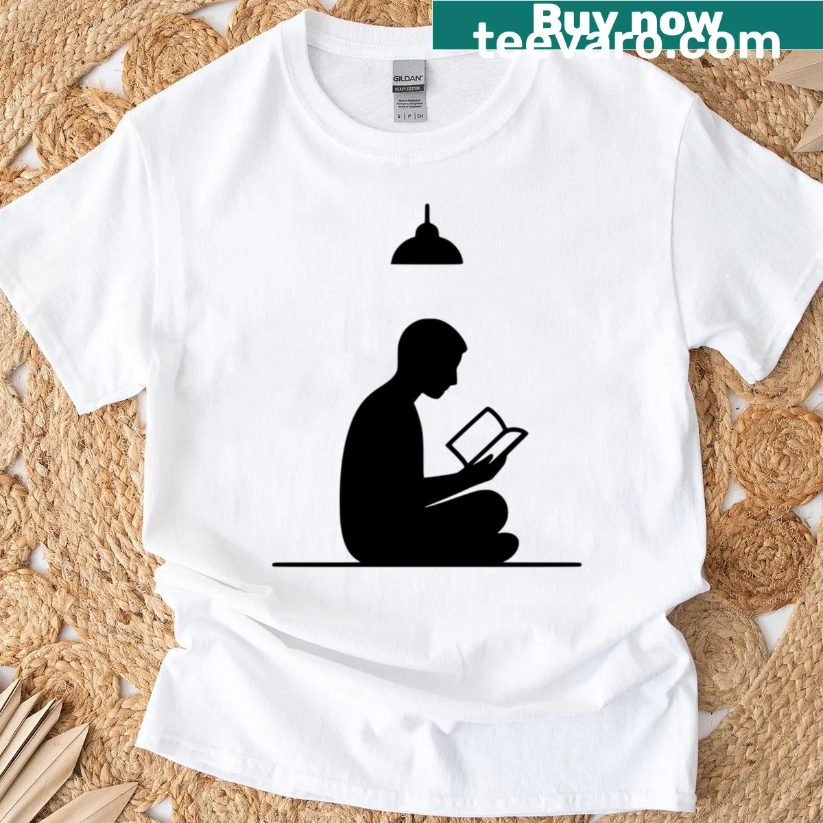Minimalist T-shirt with reading-themed design and text — on a men's t-shirt