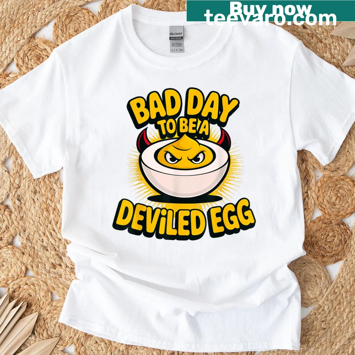 Funny T-shirt featuring a cartoon deviled egg design — on a men's t-shirt