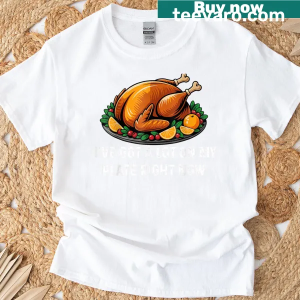Thanksgiving T-shirt with a humorous graphic of an overflowing dinner plate