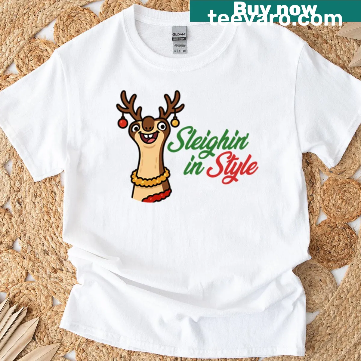 Christmas T-shirt featuring a cartoon sloth on a sleigh — on a men's t-shirt