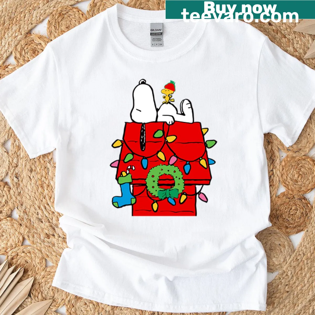 Snoopy and Woodstock in a Christmas booth with lights and wreath — on a men's t-shirt