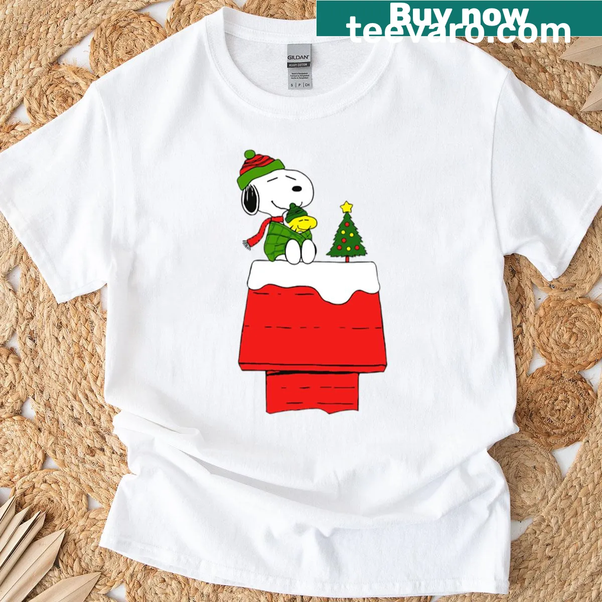 Snoopy and Woodstock in doghouse with Christmas tree illustration — on a men's t-shirt