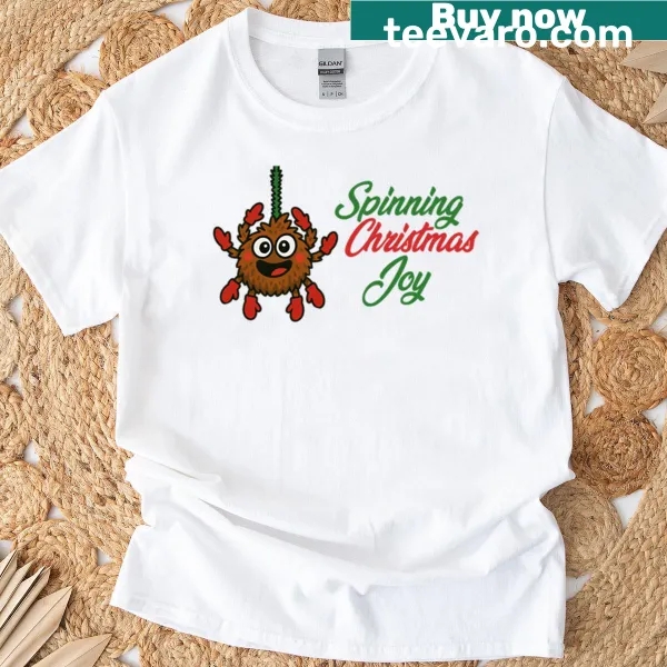 Playful Christmas T-shirt featuring a festive spider design