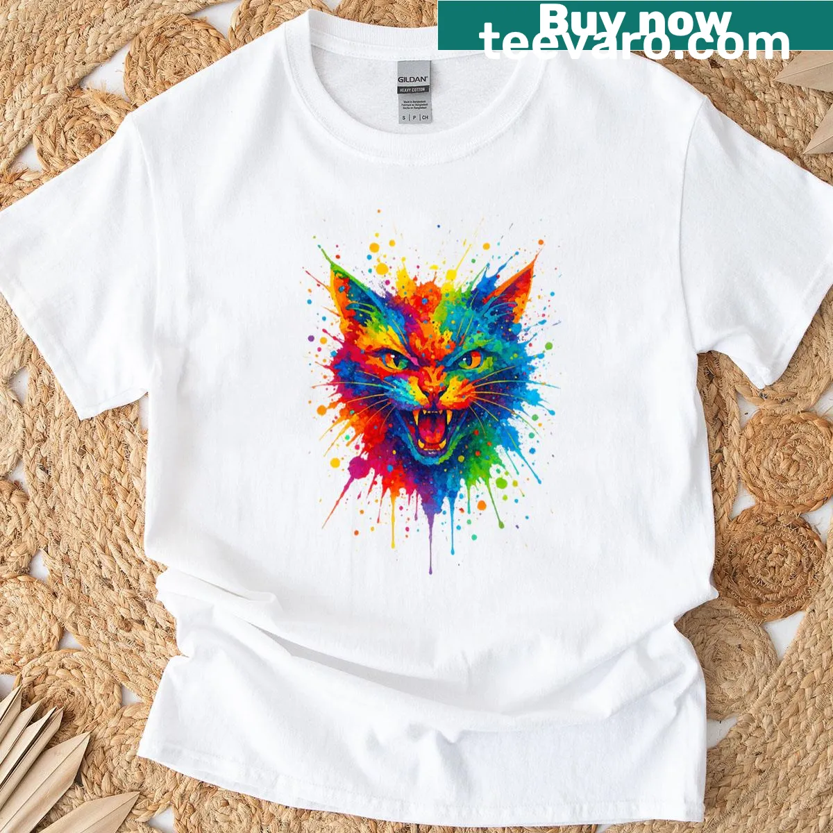 Cartoon cat graphic with colorful splatter design on T-shirt — on a men's t-shirt
