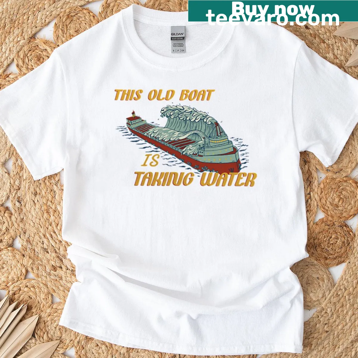 Vintage-style tribute to Edmund Fitzgerald with waves and ship graphic. — on a men's t-shirt