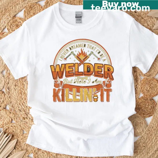Vintage distressed welder t-shirt with humorous graphic and tools design