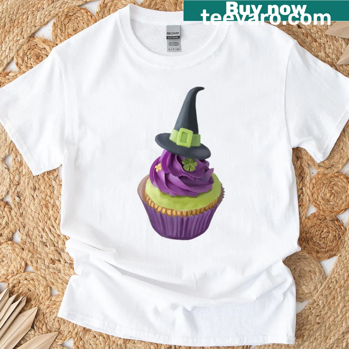 T-shirt with a whimsical cupcake design featuring witch elements — on a men's t-shirt