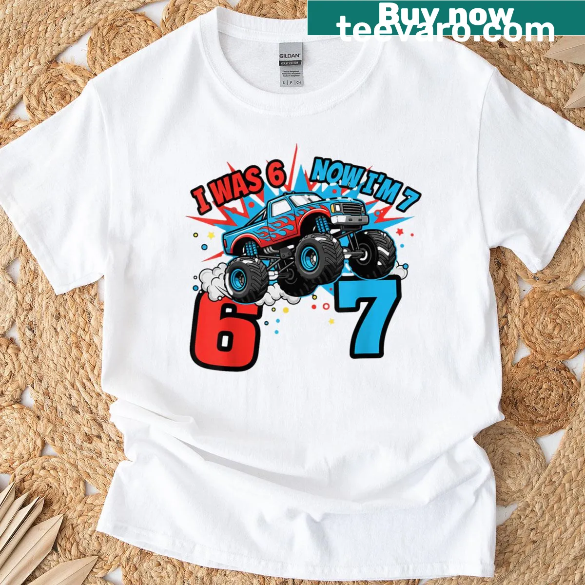 Birthday T-shirt featuring a monster truck design celebrating turning 7 — on a men's t-shirt