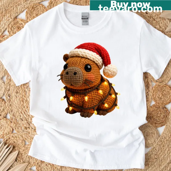 Capybara wrapped in Christmas lights illustration on a t-shirt