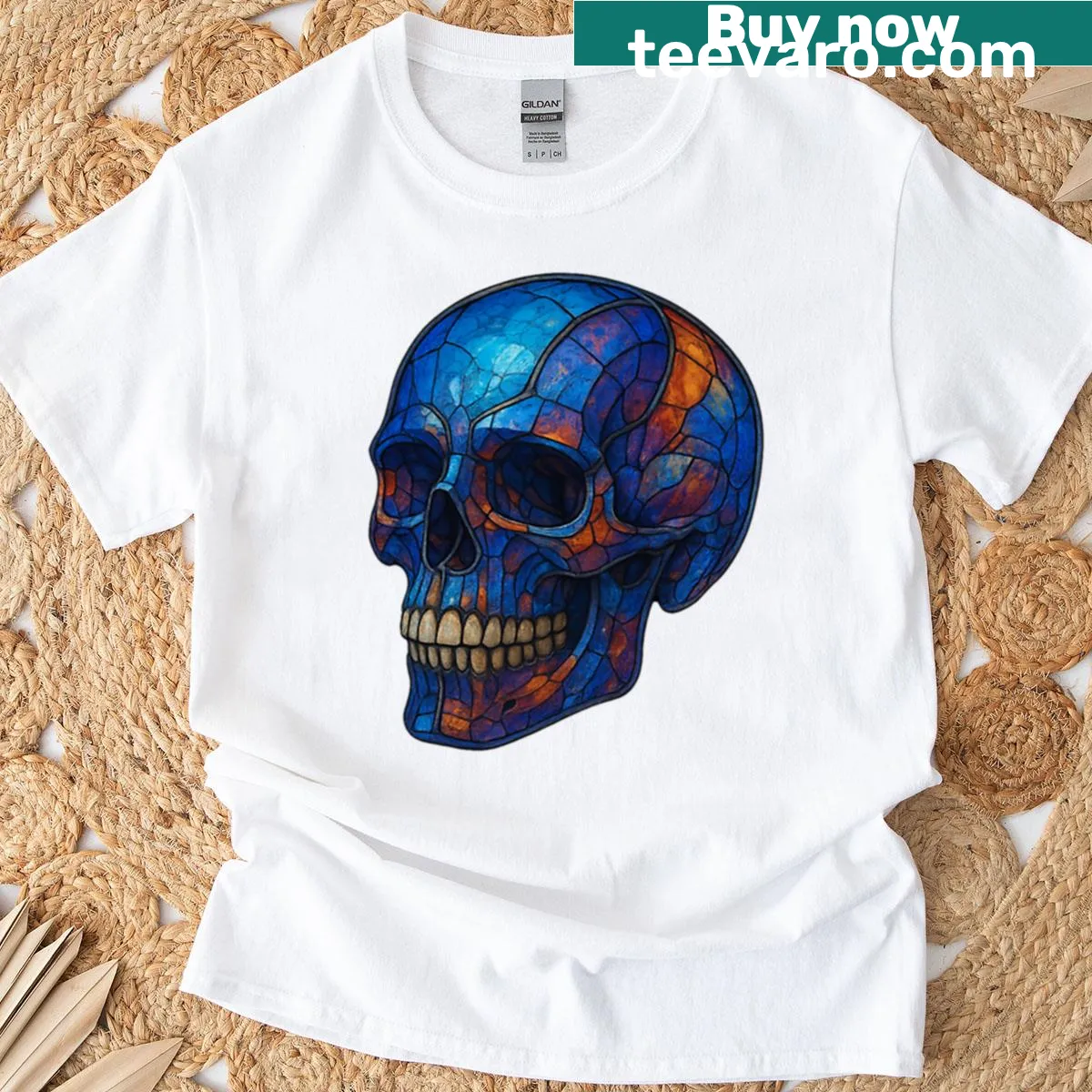 Skull surrounded by cosmic nebula graphic — on a men's t-shirt