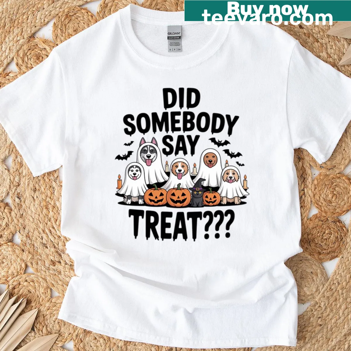 Halloween t-shirt with playful ghost dogs and treats design. — on a men's t-shirt