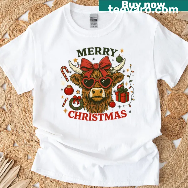 Cartoon cow with 'Merry Christmas' text