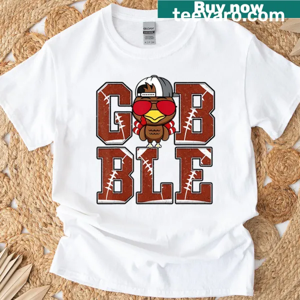 Cartoon Thanksgiving t-shirt with a turkey playing football